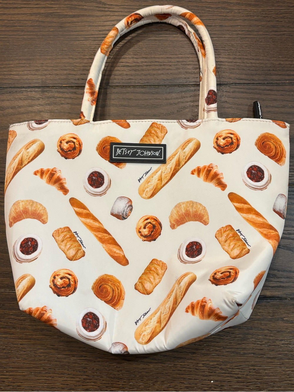 Betsey Johnson Cream and Brown Bakery Print lunch tote.
